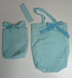 Set literario (Bolso + funda para libros + Marcapáginas) (color celeste)
